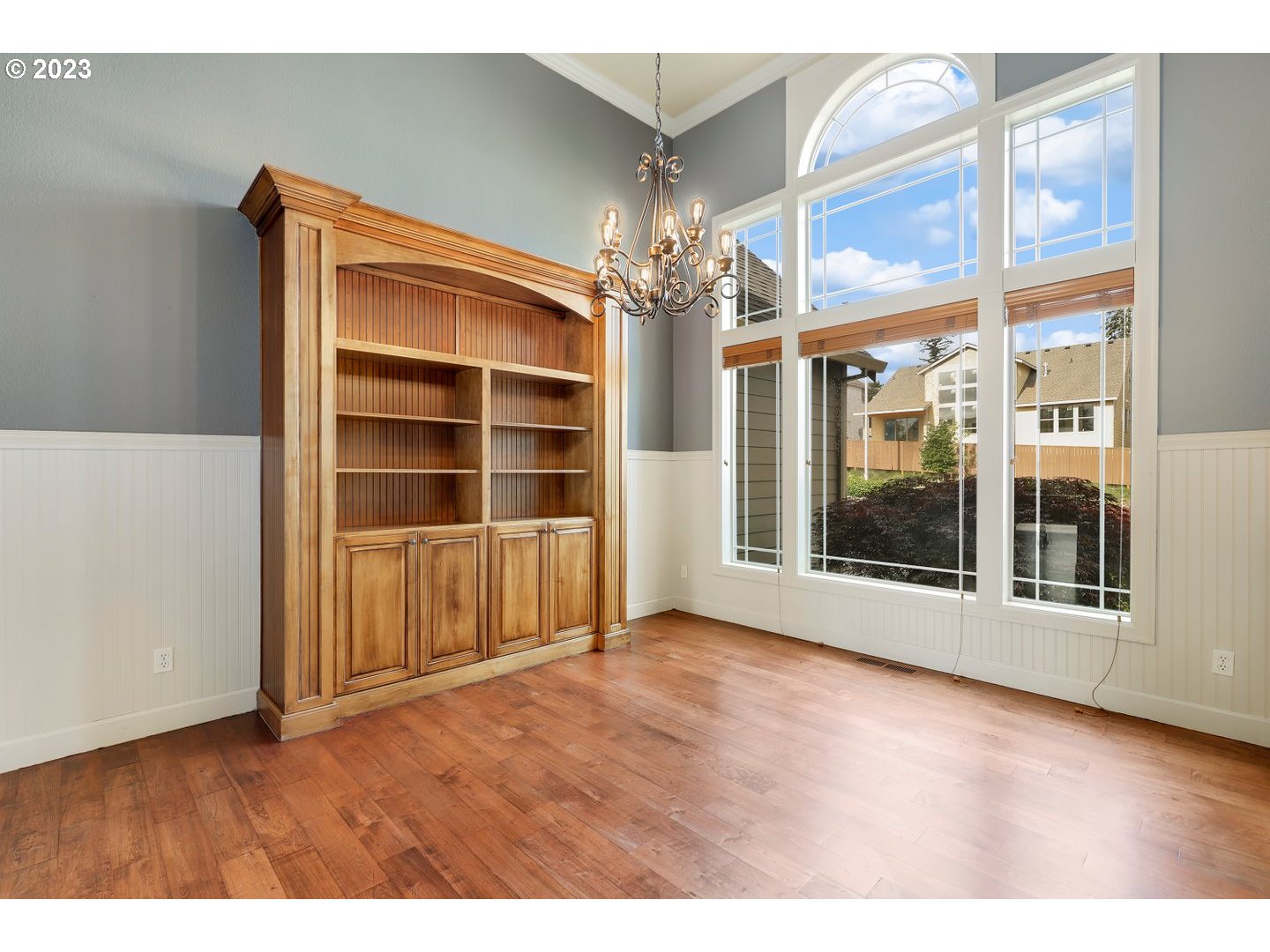 6136 Northwest Larkspur Street Camas, WA 98607 - Photo 6 of 40 a view of an empty room with a window and wooden floor