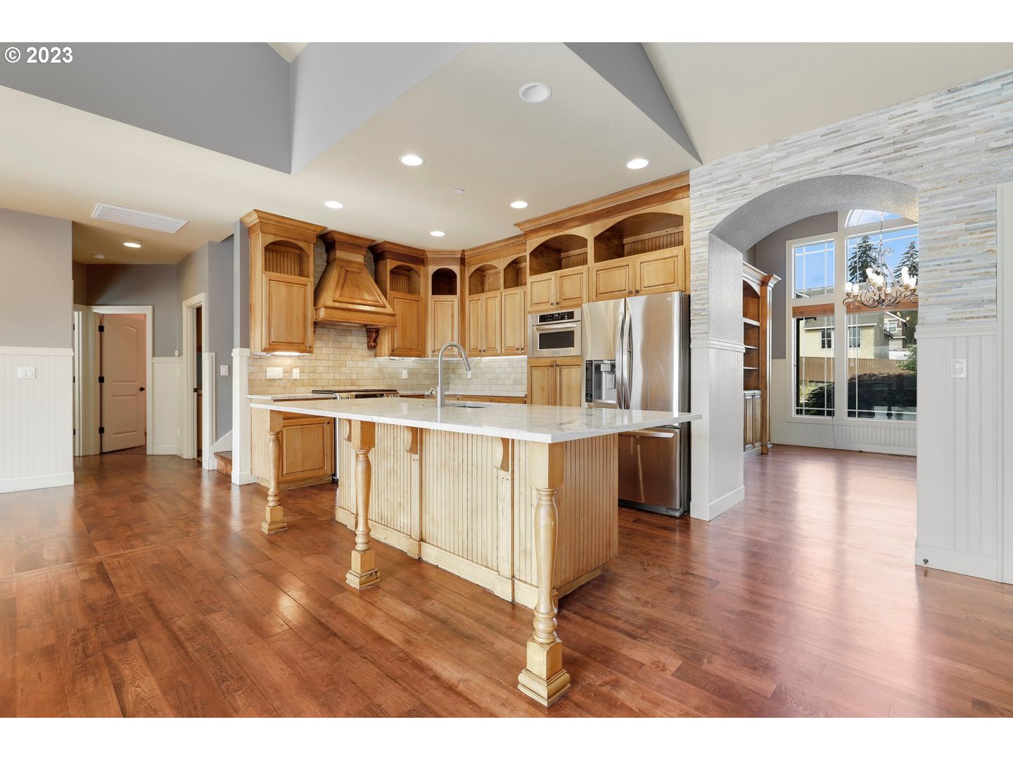 6136 Northwest Larkspur Street Camas, WA 98607 - Photo 8 of 40 a view of kitchen with cabinets and wooden floor