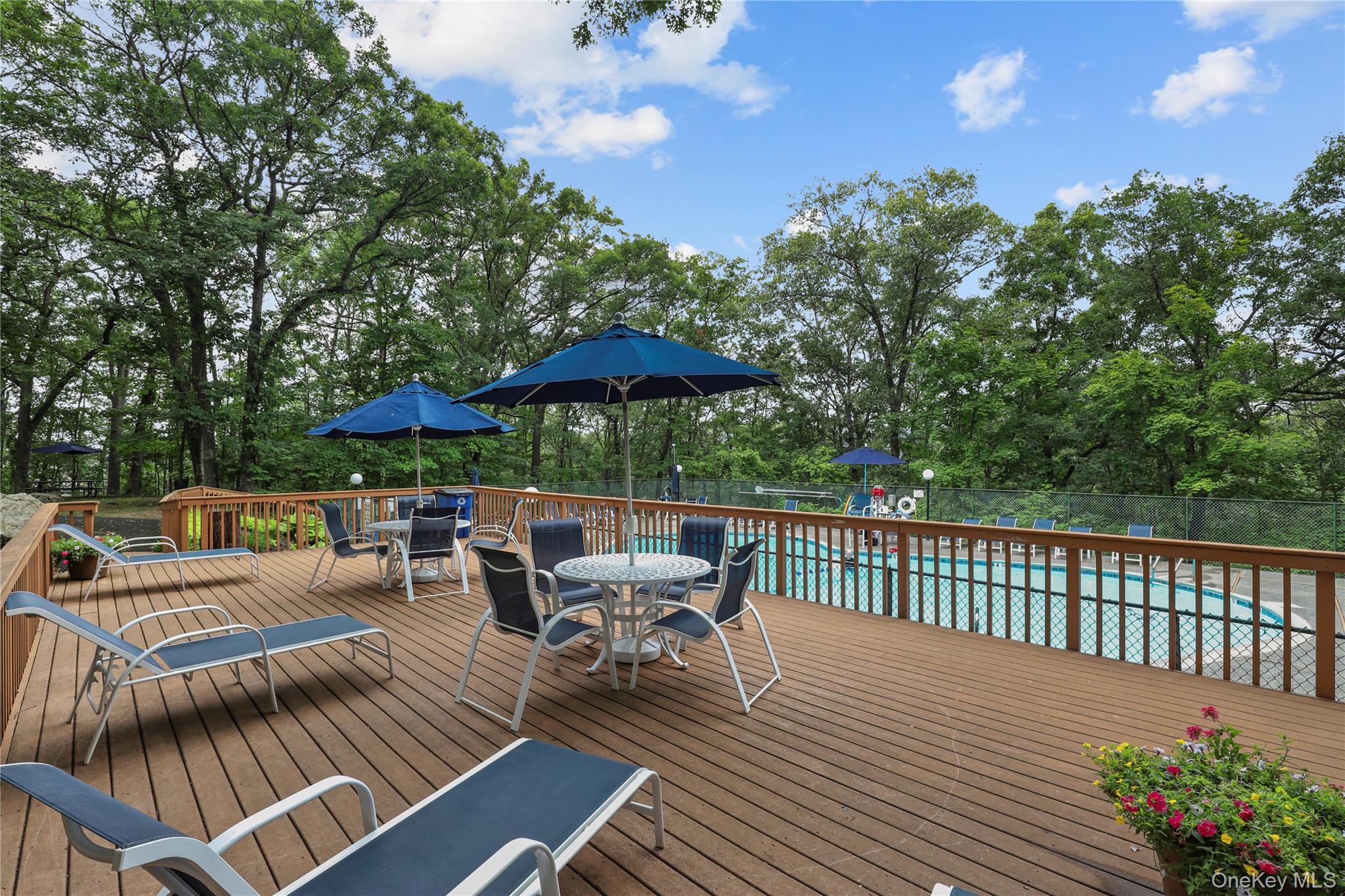 150 Overlook Avenue, Unit 6L Peekskill, NY 10566 - Photo 15 of 18 a view of balcony with outdoor seating and trees
