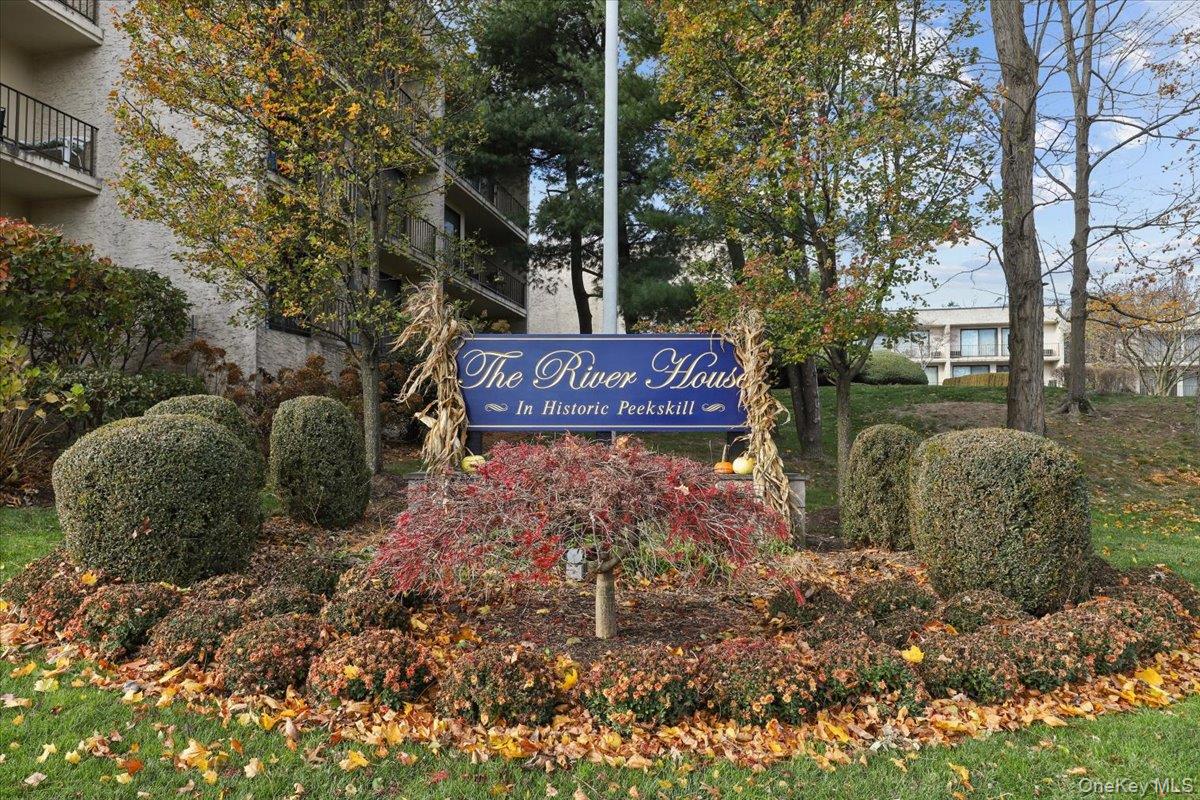 150 Overlook Avenue, Unit 6L Peekskill, NY 10566 - Photo 18 of 18 a view of a street with potted plants and large trees
