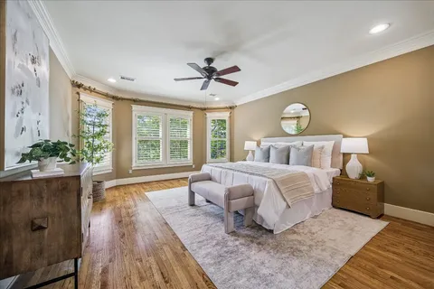 a bathroom with a granite countertop sink a mirror and a