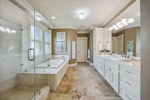 a bathroom with a toilet a sink and a bathtub