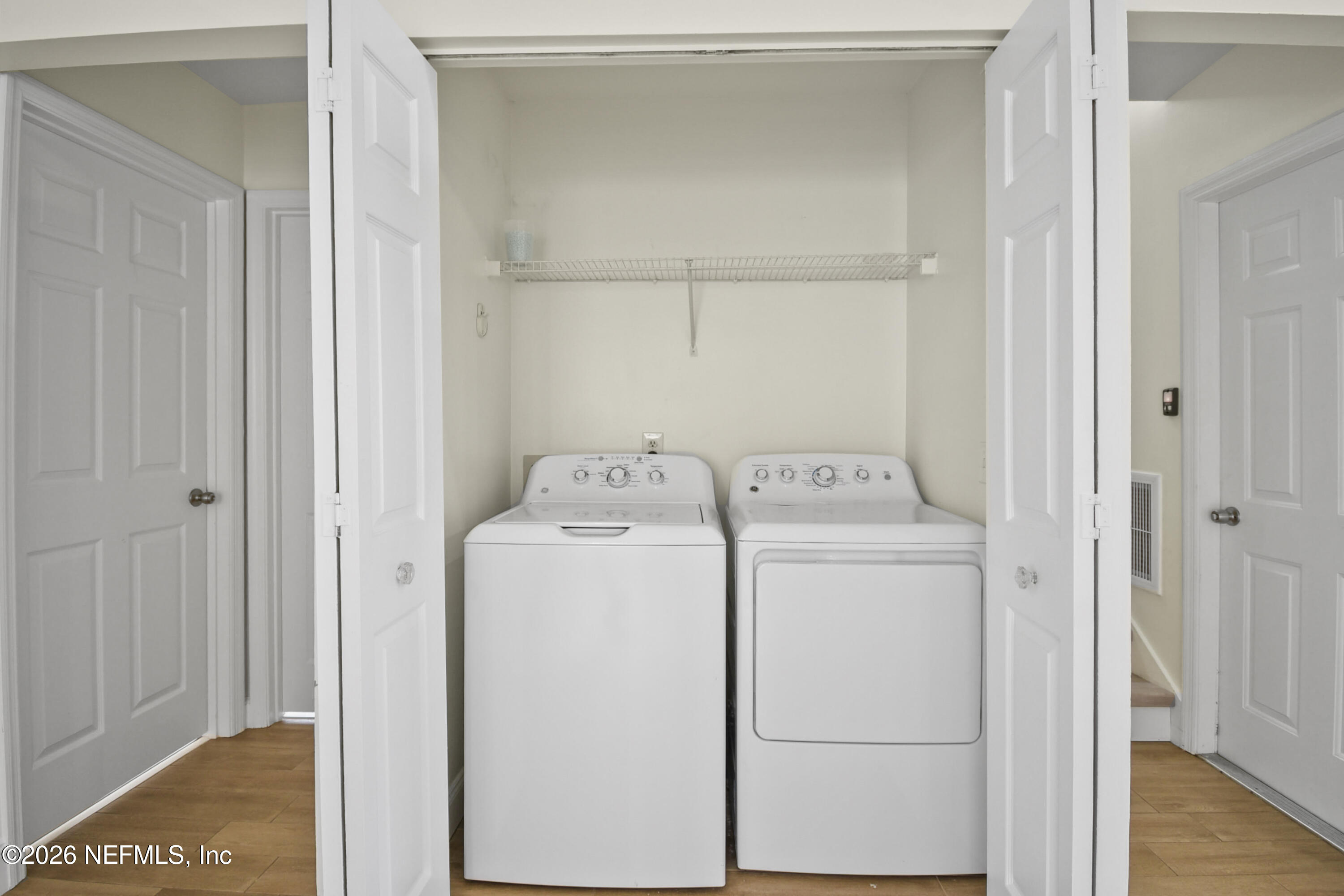 303 D Street St. Augustine Beach, FL 32080 - Photo 12 of 39 a utility room with dryer and washer