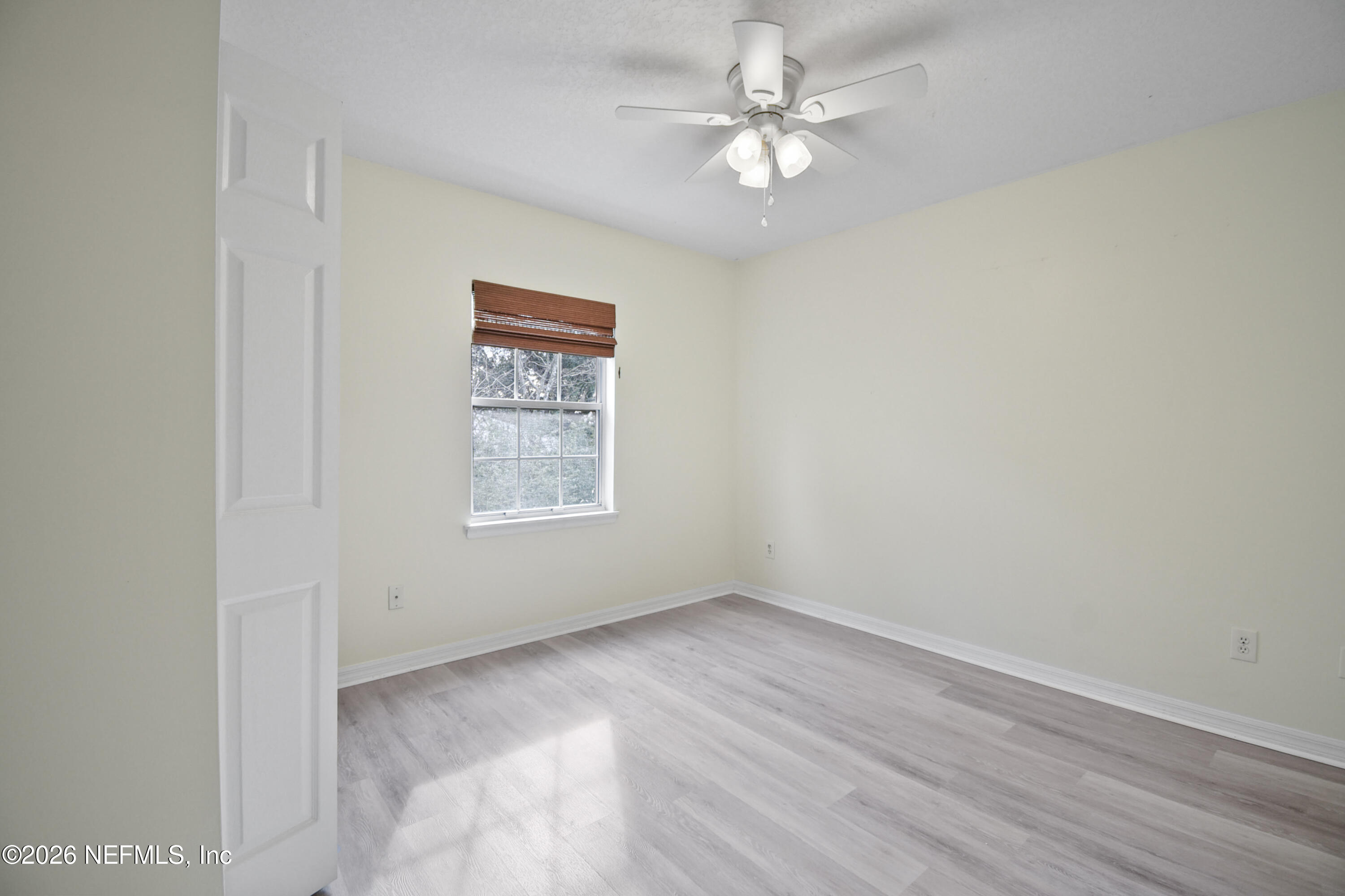 303 D Street St. Augustine Beach, FL 32080 - Photo 23 of 39 an empty room with a window