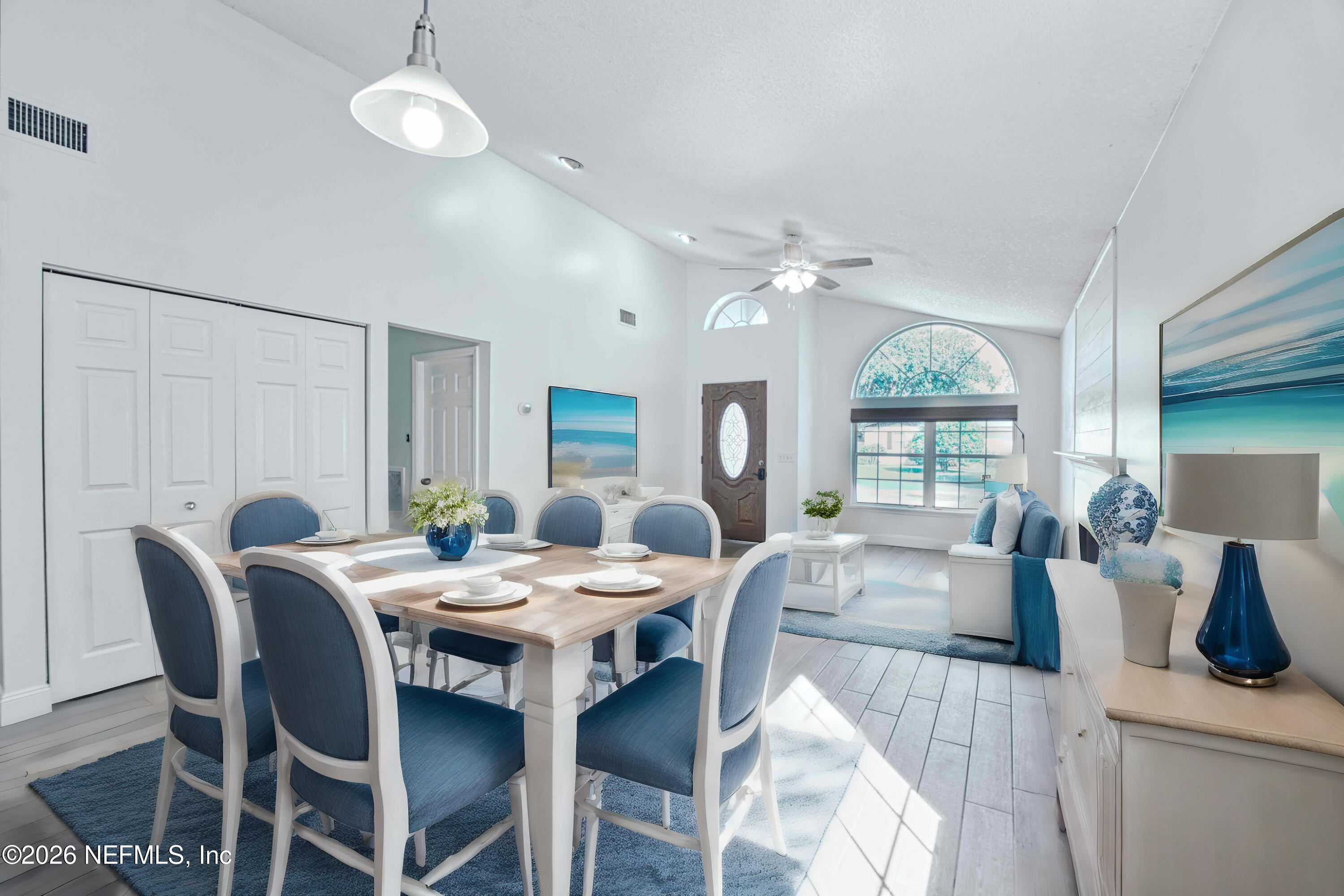 303 D Street St. Augustine Beach, FL 32080 - Photo 9 of 39 a view of a dining room with furniture window and outside view