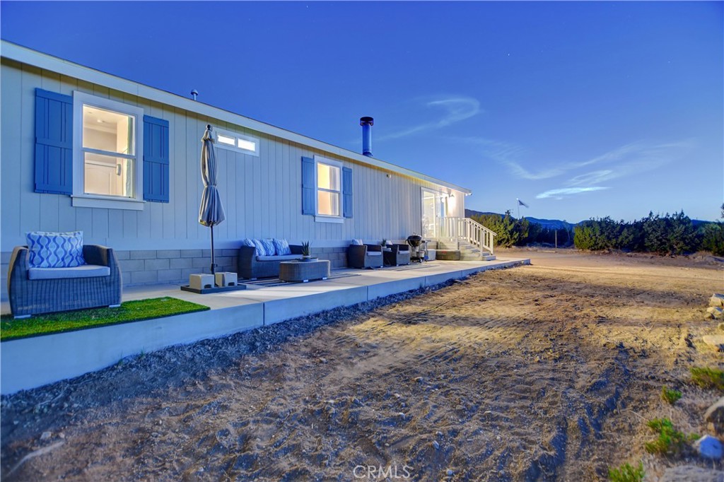 1330 Tamarack Road Pinon Hills, CA 92372 - Photo 11 of 19 a front view of a house with a yard