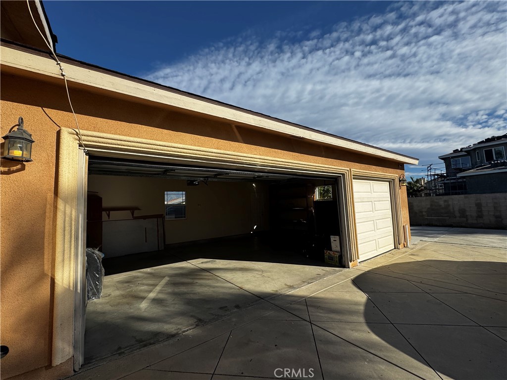 4234 Center Street Baldwin Park, CA 91706 - Photo 17 of 19 a view of a car garage door