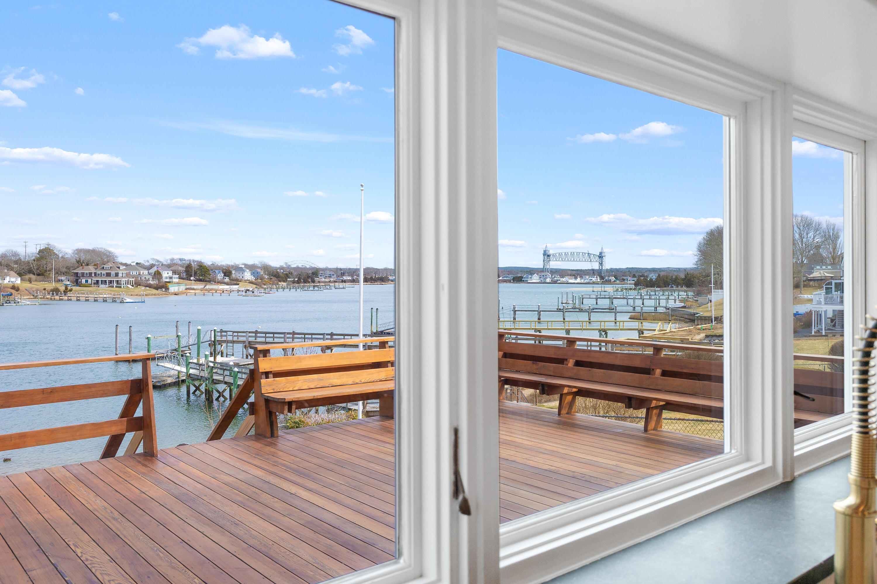 8 Pine Tree Drive Wareham, MA 02532 - Photo 12 of 36 a view of a balcony with chairs and wooden floor