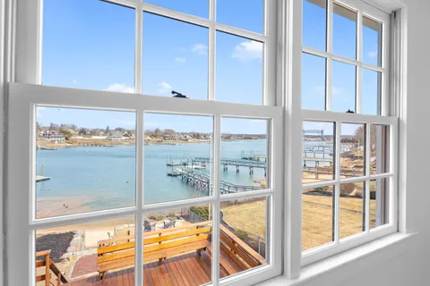 a view of a room with a large window