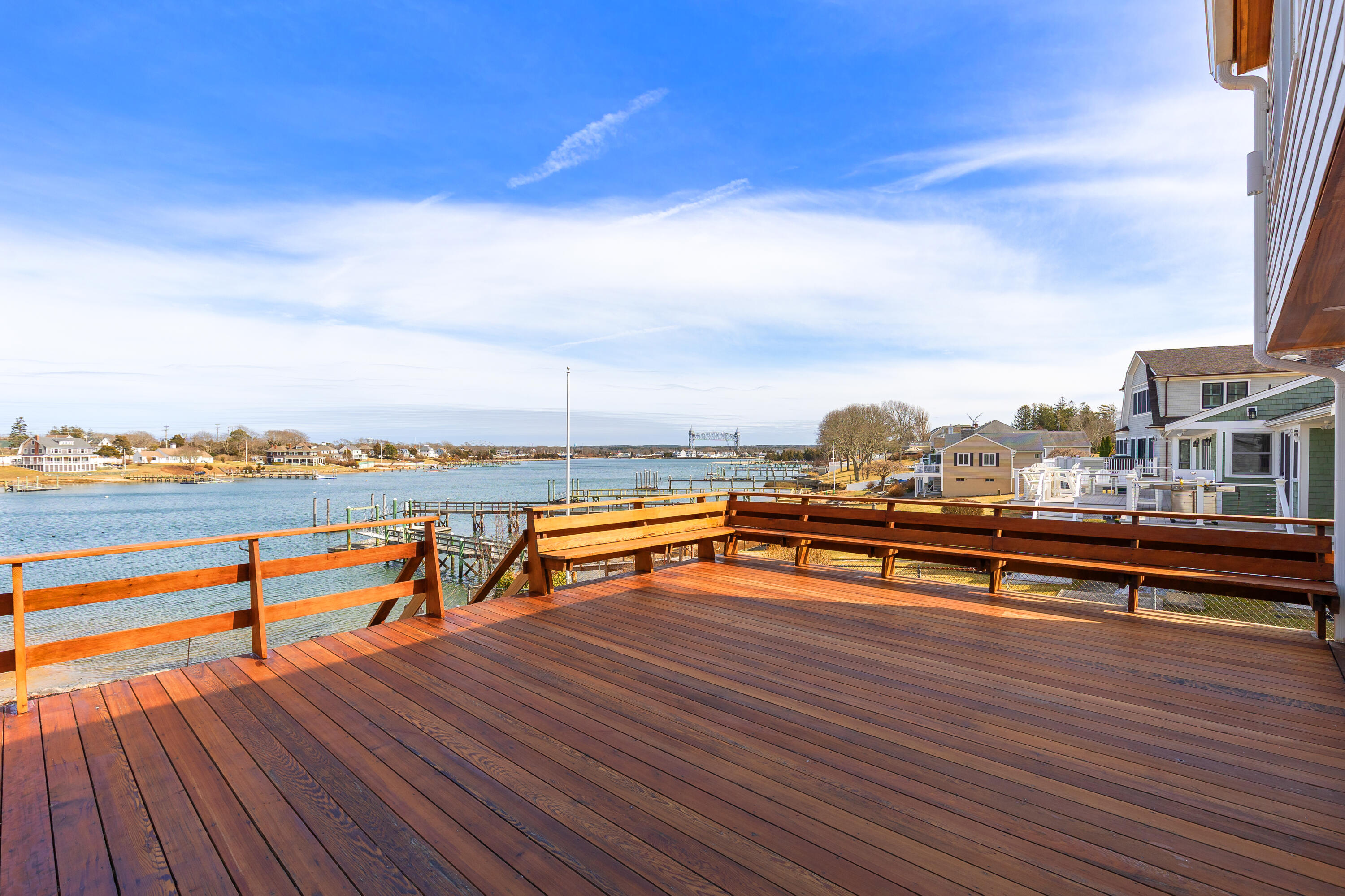 8 Pine Tree Drive Wareham, MA 02532 - Photo 33 of 36 a view of a terrace with wooden benches