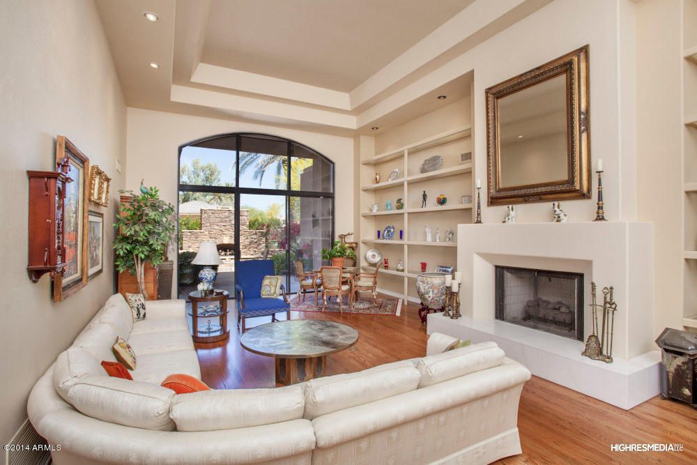 7425 East Gainey Ranch Road, Unit 49 Scottsdale, AZ 85258 - Photo 5 of 15 Living Room out to Backyard
