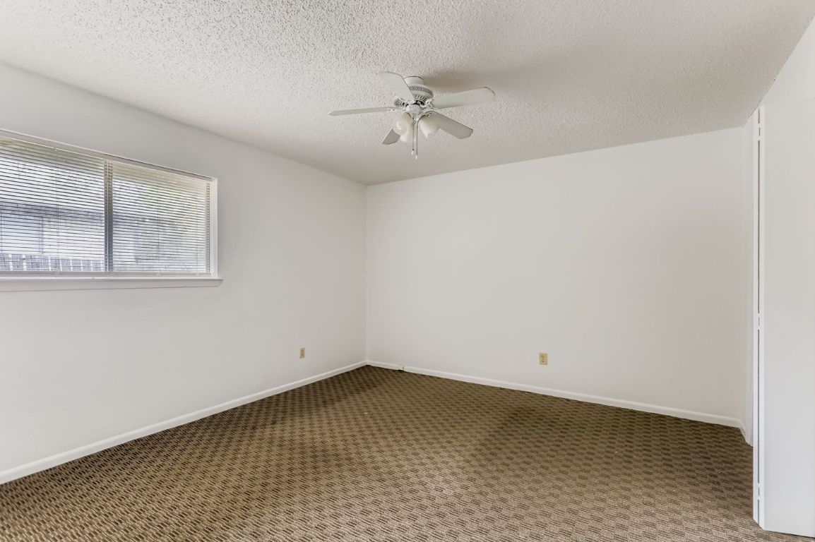 111 Stubblefield Drive Elgin, TX 78621 - Photo 11 of 27 wooden floor in an empty room
