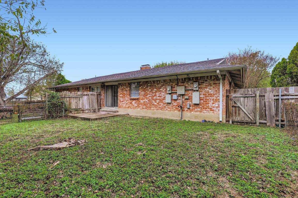 111 Stubblefield Drive Elgin, TX 78621 - Photo 26 of 27 a view of a house with backyard