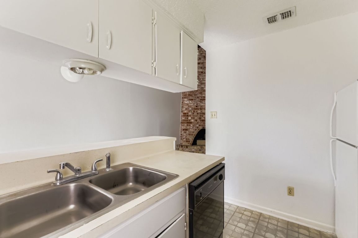 111 Stubblefield Drive Elgin, TX 78621 - Photo 7 of 27 a close view of a sink and tap