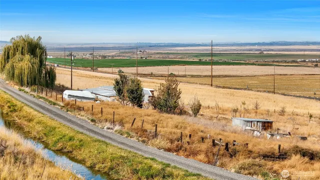 a view of an ocean beach and a mountain view