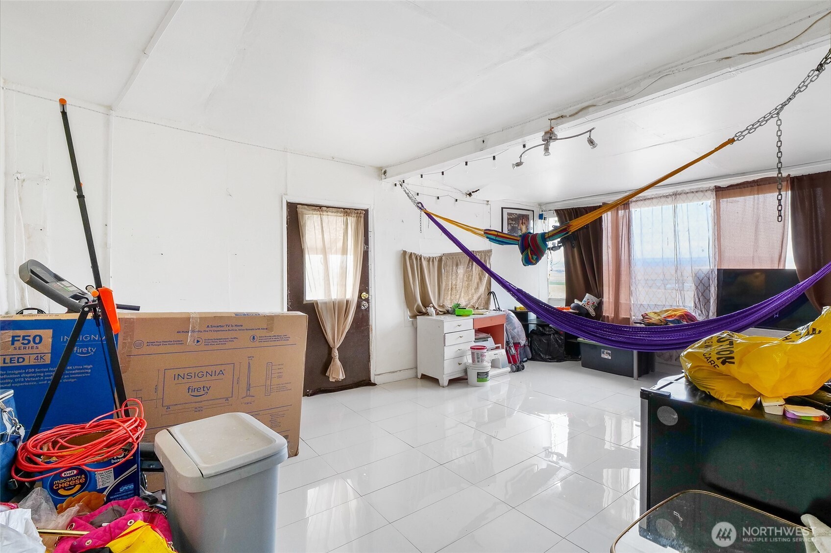 2597 W Highway Othello, WA 99344 - Photo 26 of 40 a living room with furniture and stairs