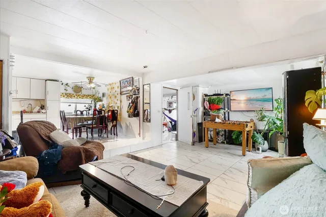 a view of a kitchen and dining room