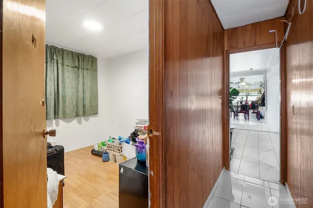 a view of a workspace with furniture and a living room
