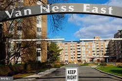 a view of a street with a building in front of it