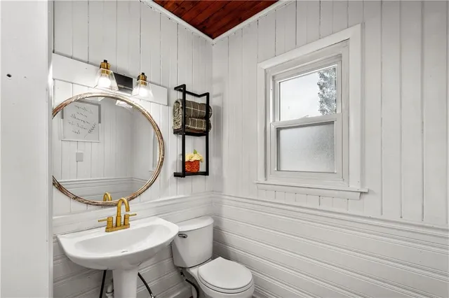 a bathroom with a tub and shower