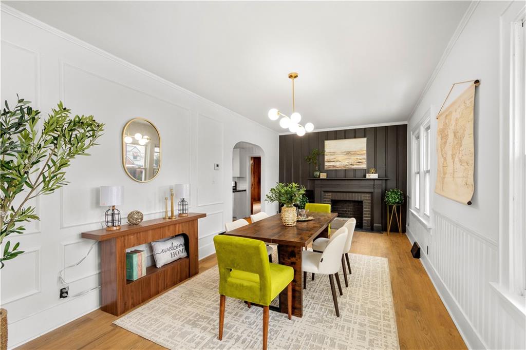 147 Carmichaels Street Rices Landing, PA 15357 - Photo 13 of 36 a view of a livingroom with furniture a flat screen tv and wooden floor