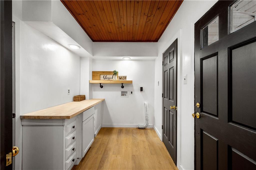 147 Carmichaels Street Rices Landing, PA 15357 - Photo 13 of 36 a bathroom with a sink a mirror and a shower