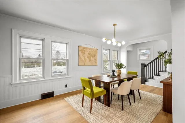 a view of a dining room kitchen and a wooden floor