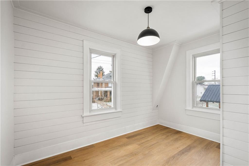 147 Carmichaels Street Rices Landing, PA 15357 - Photo 27 of 36 an empty room with windows