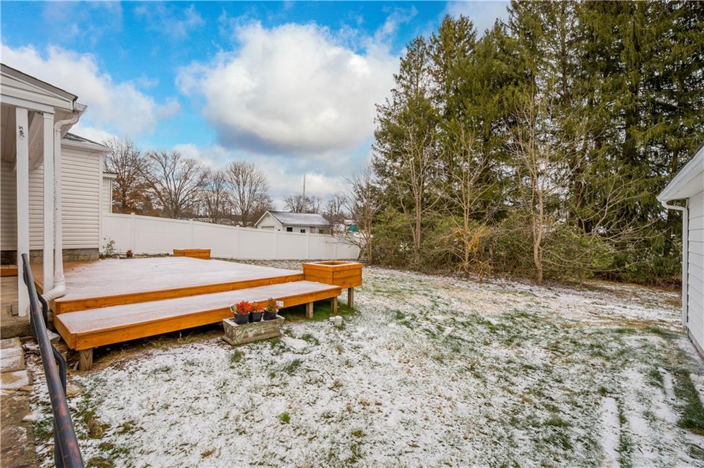 147 Carmichaels Street Rices Landing, PA 15357 - Photo 29 of 36 a backyard of a house with table and chairs