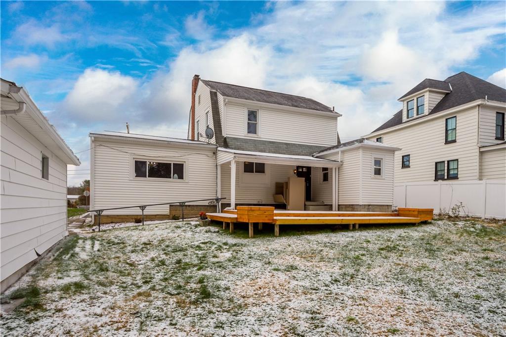 147 Carmichaels Street Rices Landing, PA 15357 - Photo 32 of 36 a front view of a house with garden