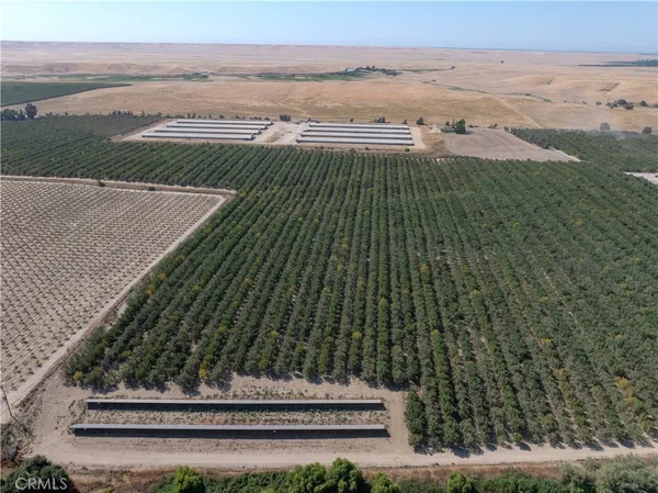 a view of a street with an ocean view