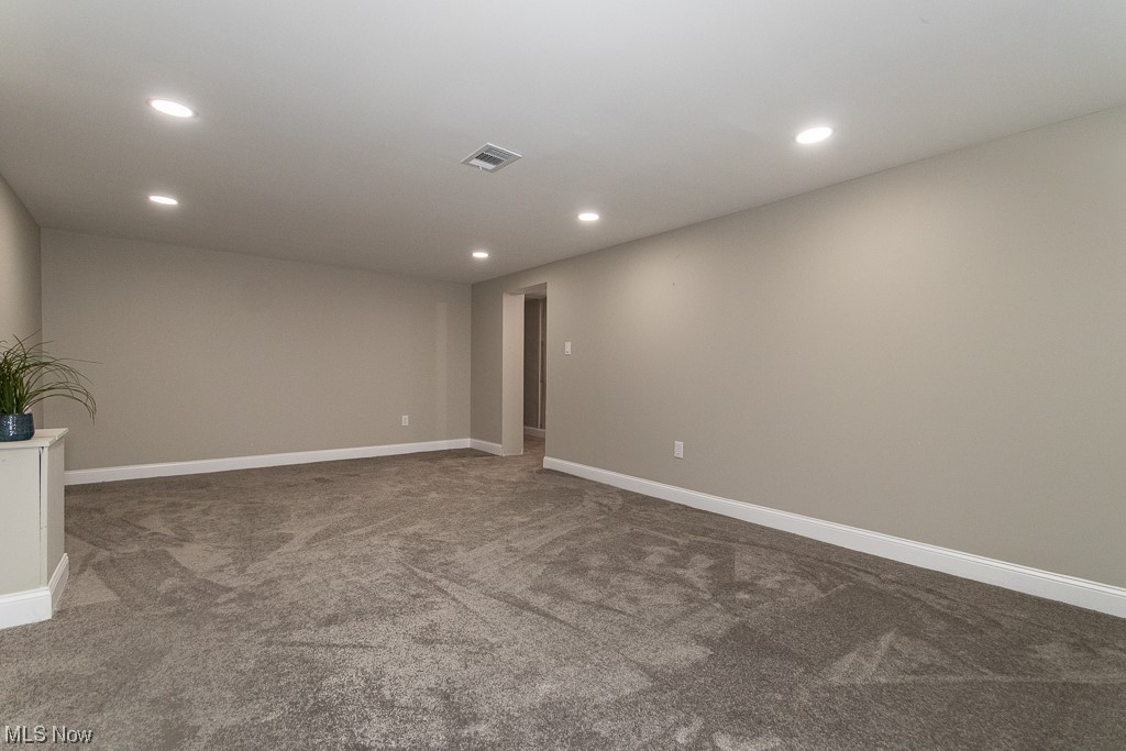 4980 Emmet Road Lyndhurst, OH 44124 - Photo 32 of 39 Unfurnished room featuring dark colored carpet
