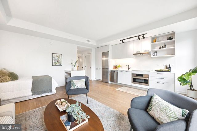 a living room with furniture and a couch