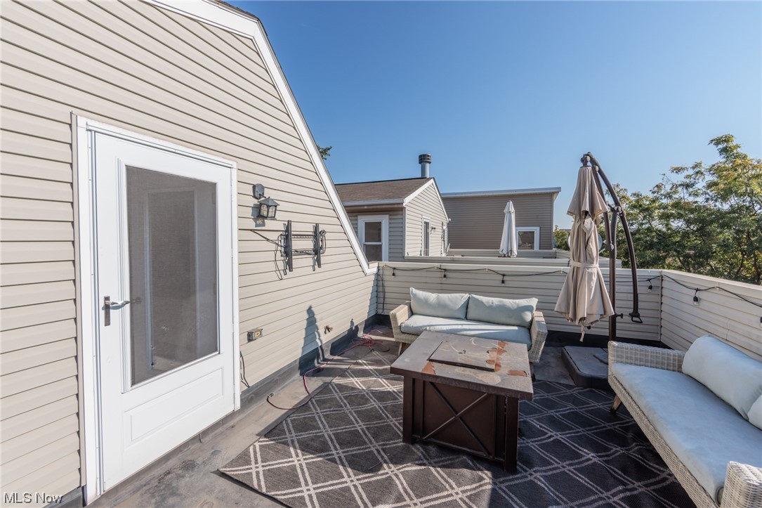 603 Literary Road Cleveland, OH 44113 - Photo 27 of 35 View of patio / terrace with an outdoor living space