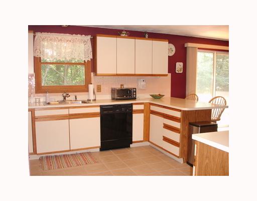 24 Beaver Road Barrington, RI 02806 - Photo 6 of 8 Kitchen. Huge eat-in-kitchen with dining bar, desk, and ample of counter space.
