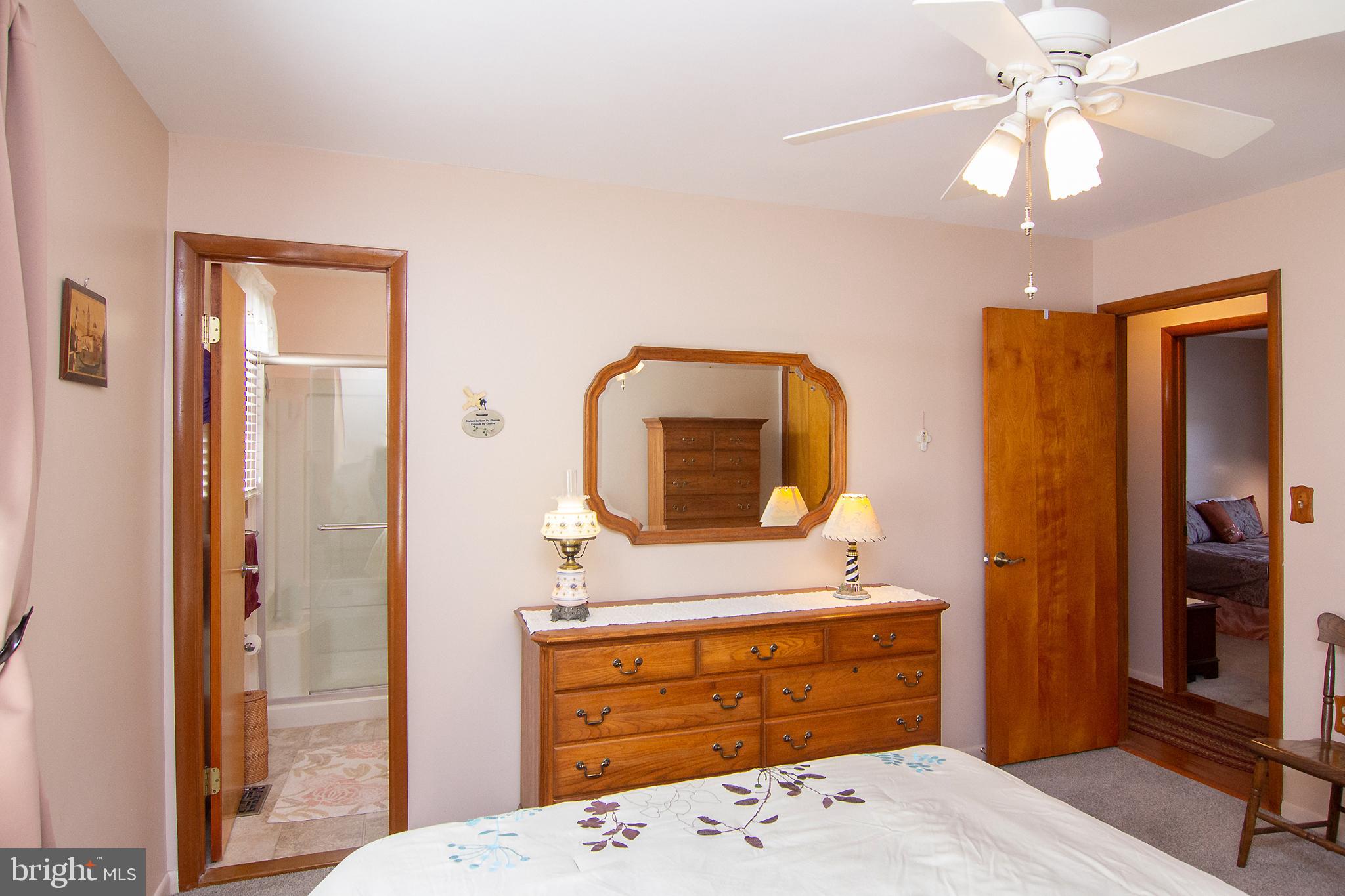 4200 Arthur Shipley Road Westminster, MD 21157 - Photo 21 of 46 a bedroom with a bed and a dresser
