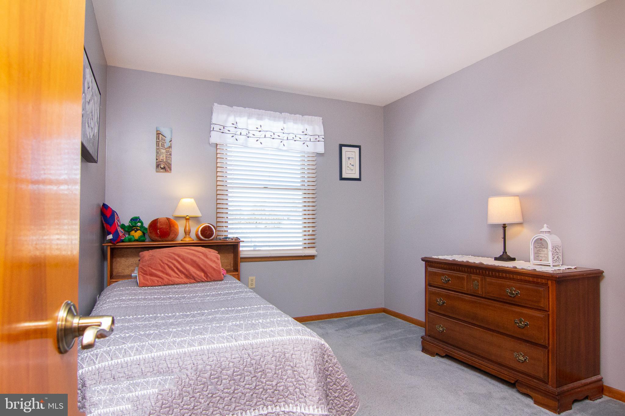 4200 Arthur Shipley Road Westminster, MD 21157 - Photo 23 of 46 a bedroom with a bed and a window
