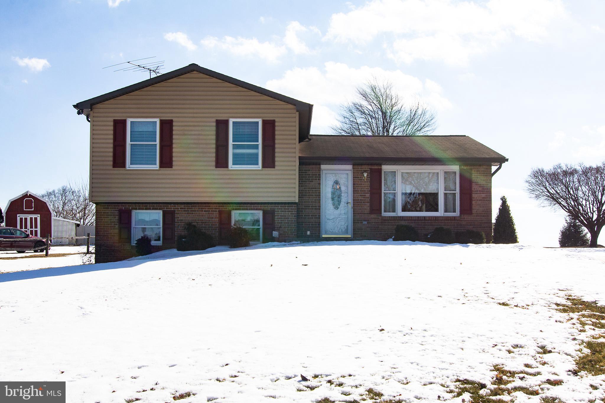 4200 Arthur Shipley Road Westminster, MD 21157 - Photo 41 of 46 a front view of a house with a yard