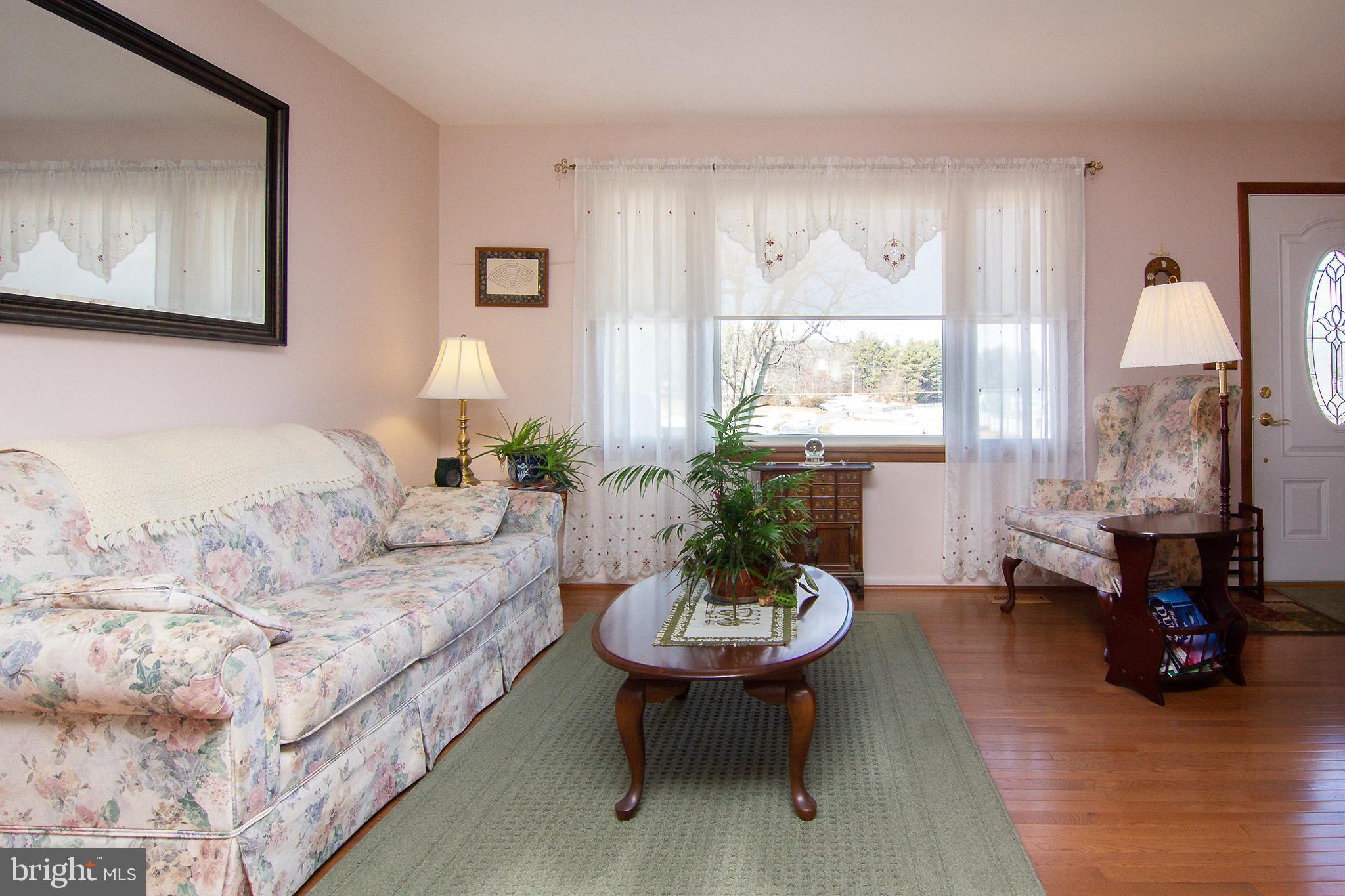 4200 Arthur Shipley Road Westminster, MD 21157 - Photo 7 of 46 a living room with furniture and a large window