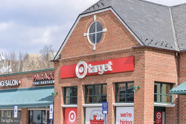 a view of a building with sitting area