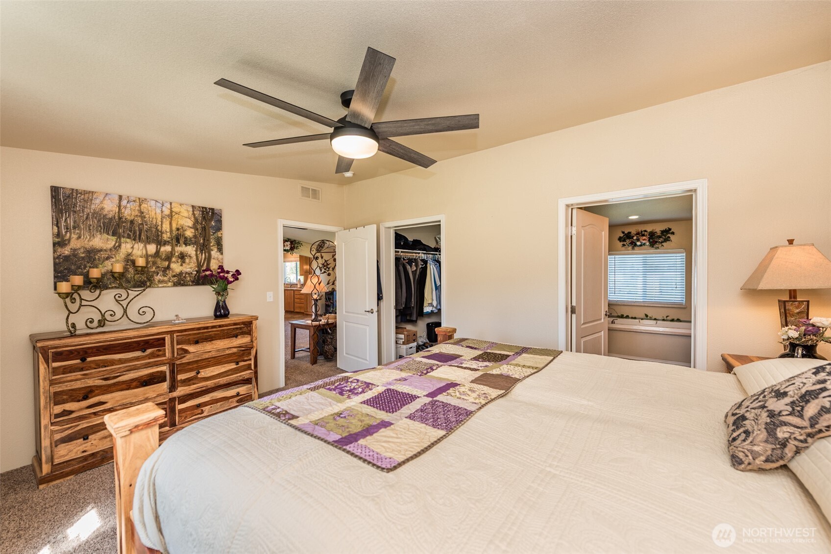 25 Michelle Lane Sequim, WA 98382 - Photo 12 of 38 a bedroom with a bed and a dresser
