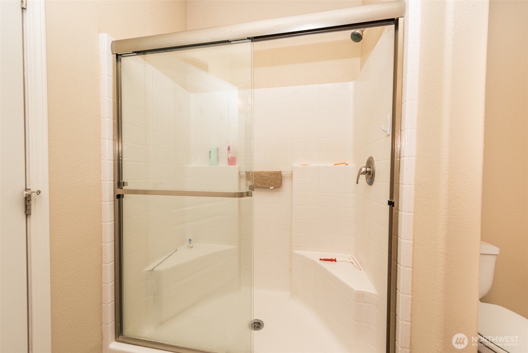25 Michelle Lane Sequim, WA 98382 - Photo 15 of 38 a bathroom with a glass shower door