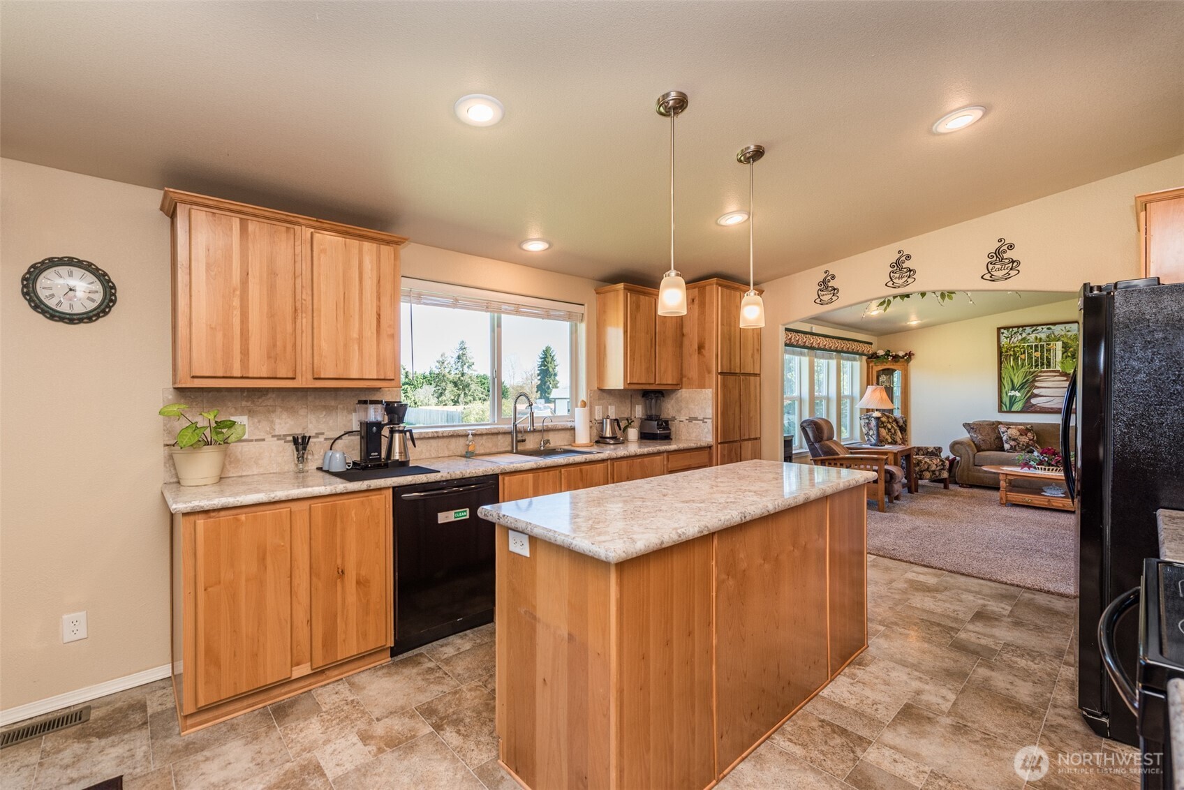 25 Michelle Lane Sequim, WA 98382 - Photo 23 of 38 a kitchen with stainless steel appliances granite countertop sink stove and refrigerator