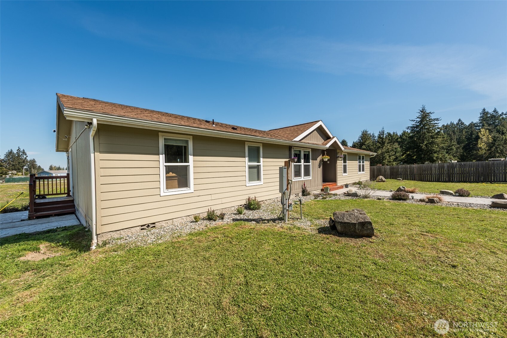 25 Michelle Lane Sequim, WA 98382 - Photo 31 of 38 a front view of a house with yard and seating space