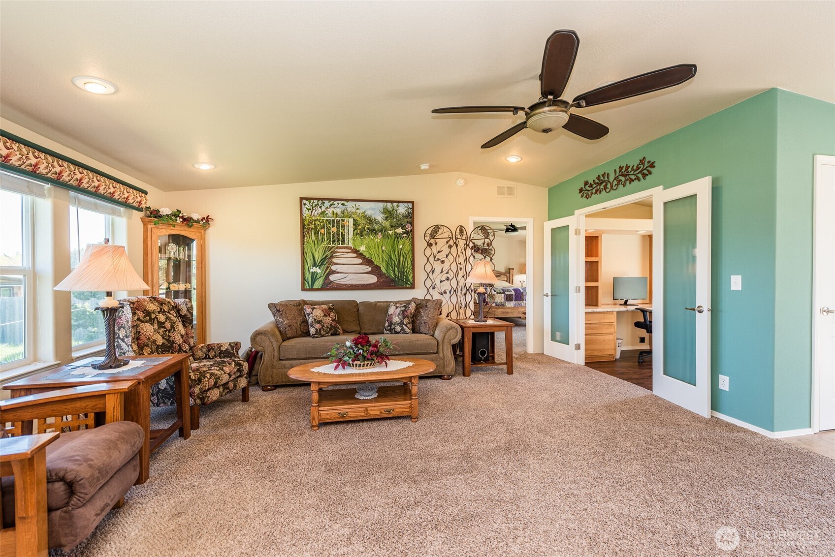 25 Michelle Lane Sequim, WA 98382 - Photo 9 of 38 a living room with furniture ceiling fan and a large window
