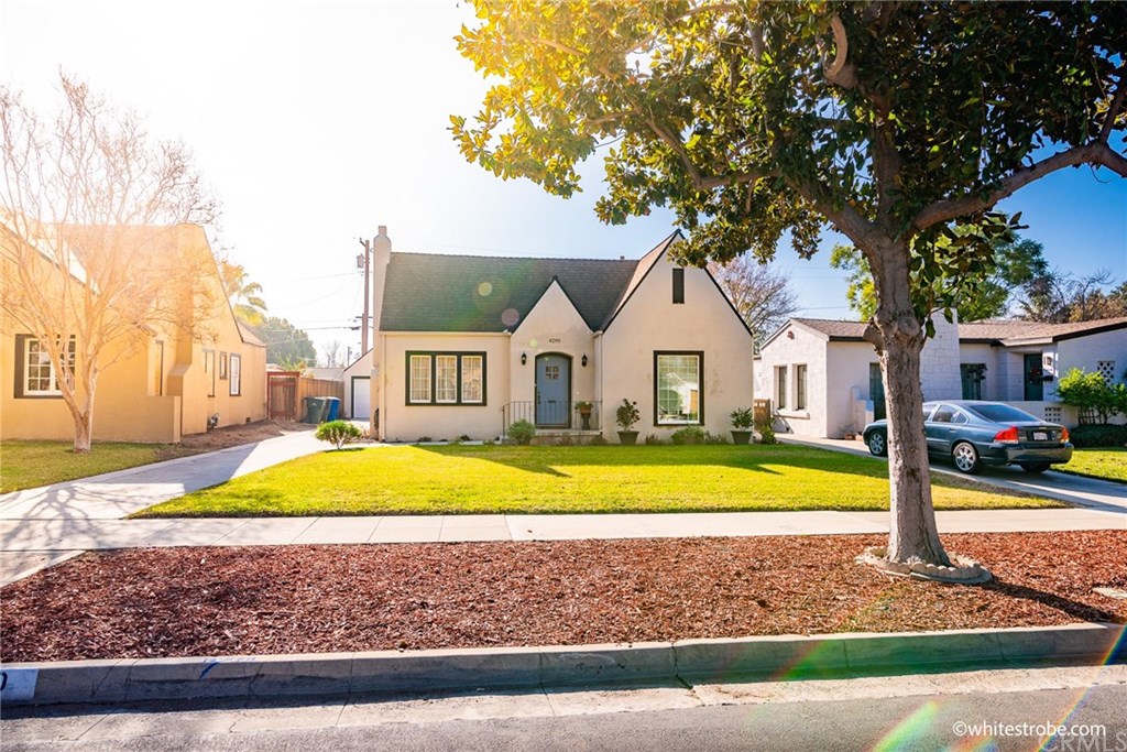 4290 Beatty Drive Riverside, CA 92506 - Photo 1 of 1 Front home Left Driveway with detached garage