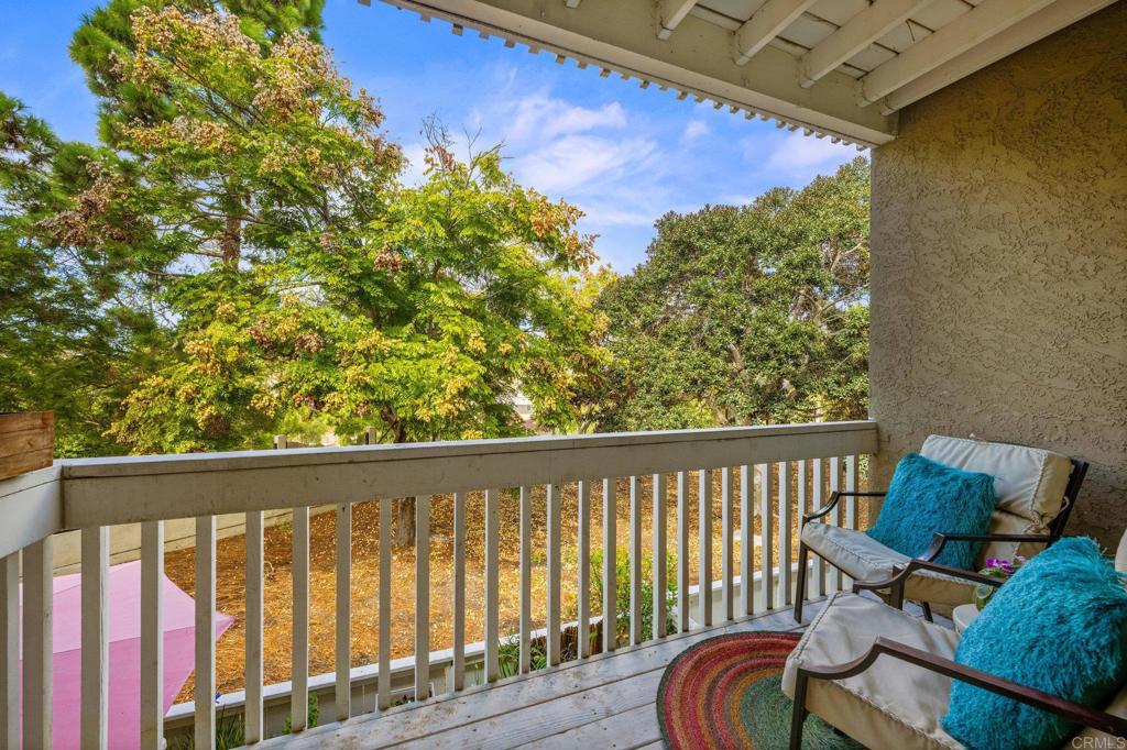 4232 Fiesta Way, Unit 3 Oceanside, CA 92057 - Photo 17 of 33 a view of a chair and table in the balcony