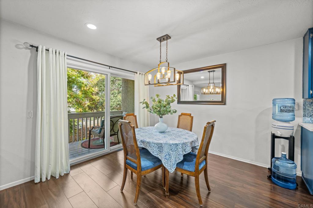 4232 Fiesta Way, Unit 3 Oceanside, CA 92057 - Photo 5 of 33 a view of a dining room with furniture window and wooden floor