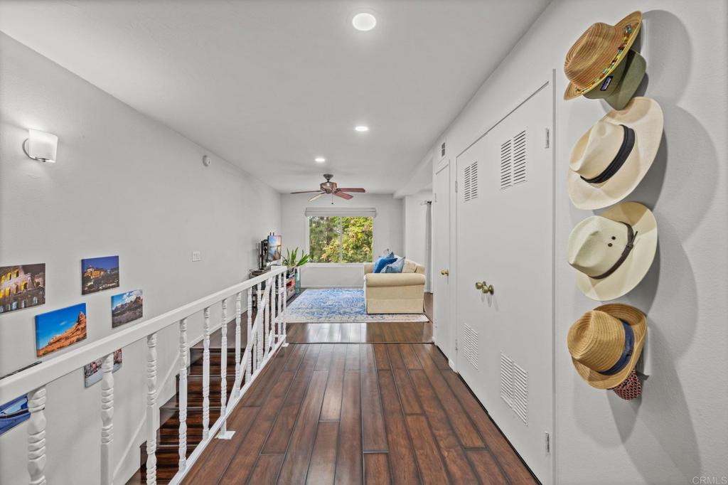 4232 Fiesta Way, Unit 3 Oceanside, CA 92057 - Photo 7 of 33 a view of entryway with wooden floor