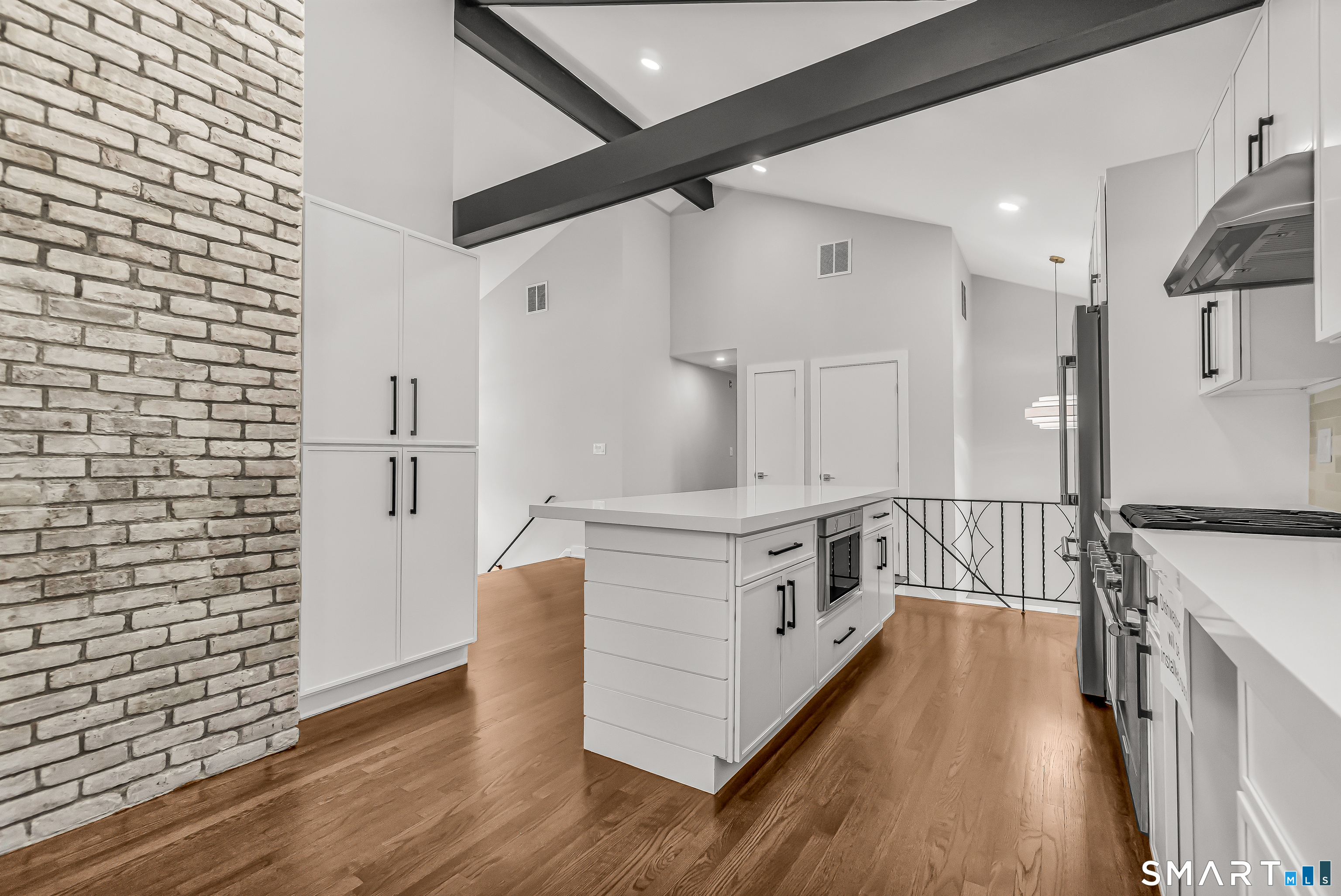 73 Buck Hill Road Easton, CT 06612 - Photo 14 of 44 a kitchen with stainless steel appliances a stove top oven a sink and a refrigerator